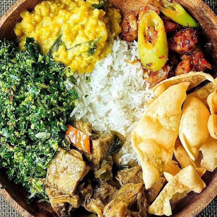 Sri Lanka Rice and curry
White rice with baby jackfruit, capsicum, dhal curry, mallum (green leaves), papadam.