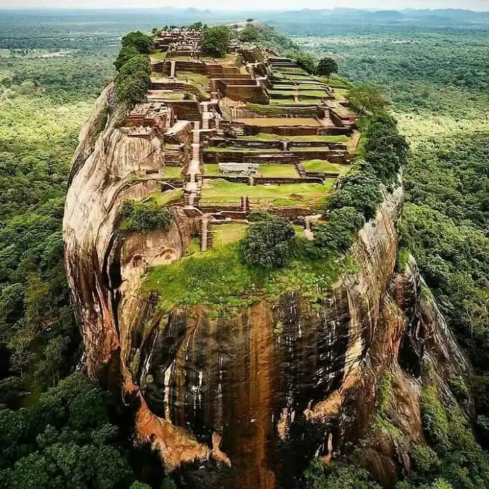 Image of the Sigiriya Rock Fortress in Sri Lanka. The image shows the ruins on the Sigiriya Rock Summit and Peak. 